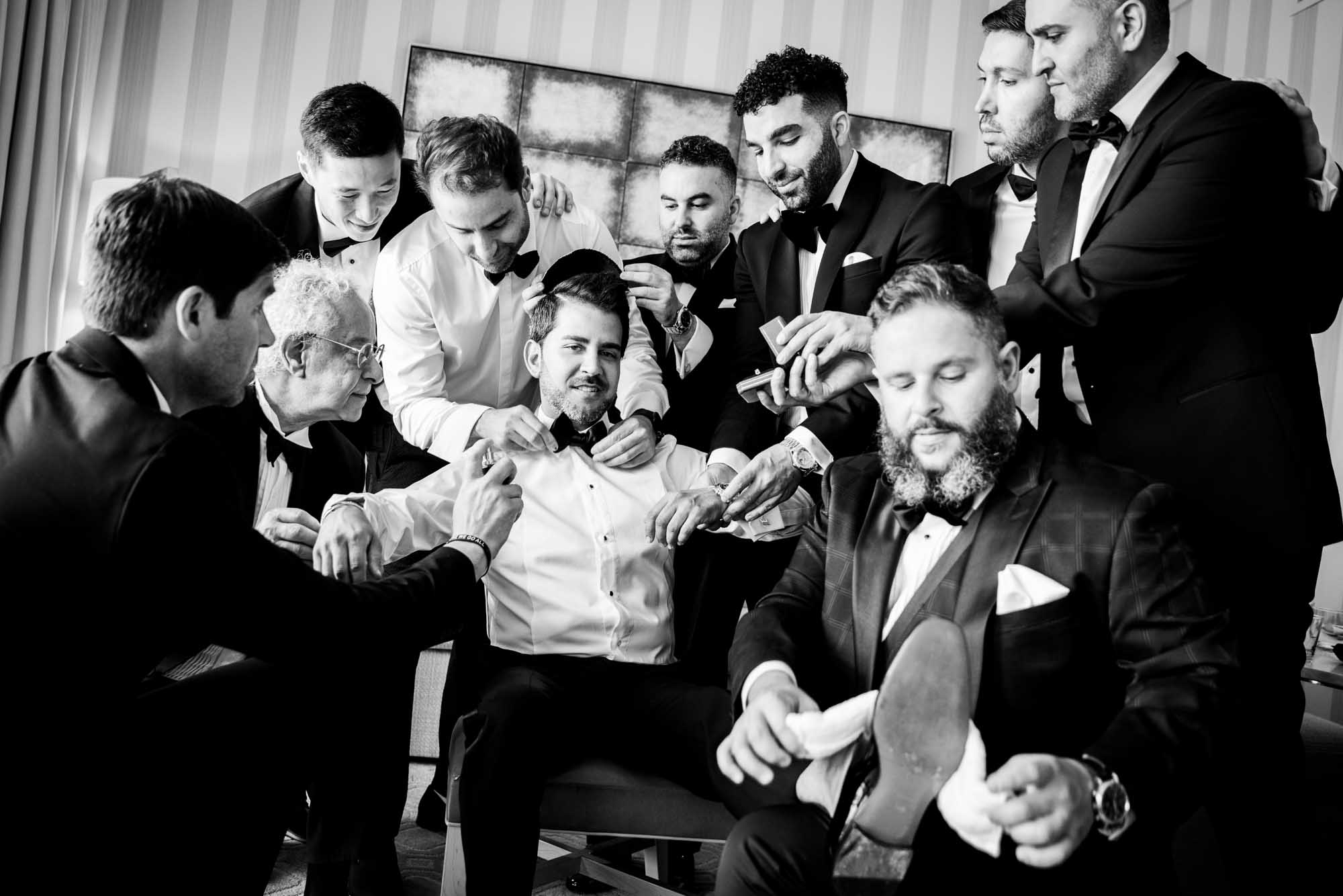 Group of women celebrating a luxury bachelorette party with champagne, photographed in an editorial style by a Dubai wedding and proposal photographer.