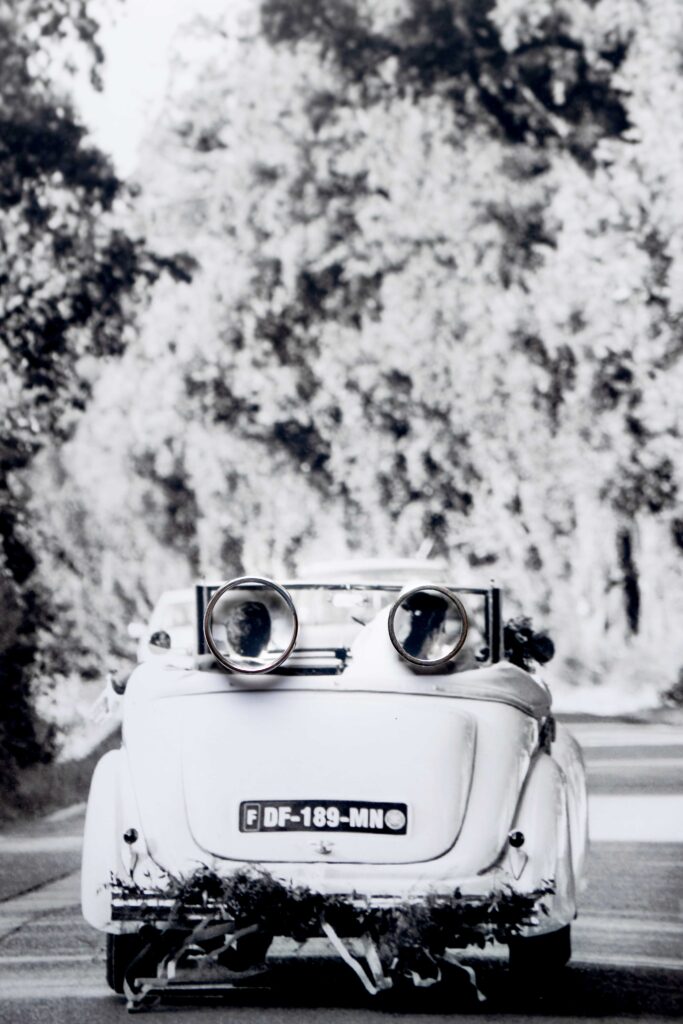 Wedding rings on vintage car photo during a French Riviera celebration, captured by French Riviera wedding photographer