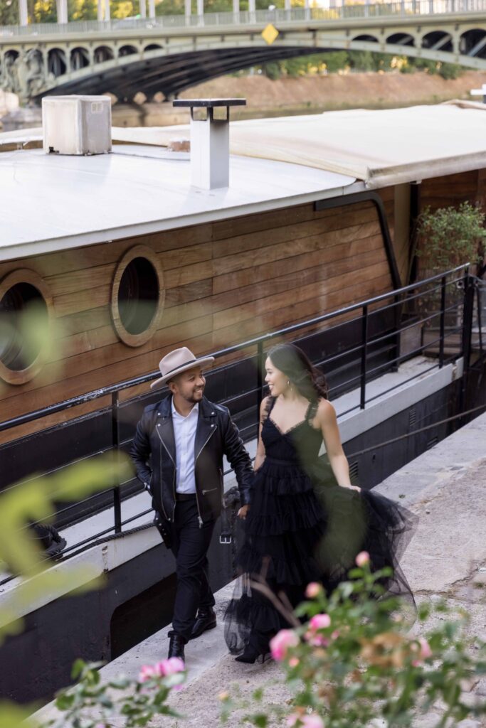 Couple walking beside a yacht photographed by a Dubai couple photographer